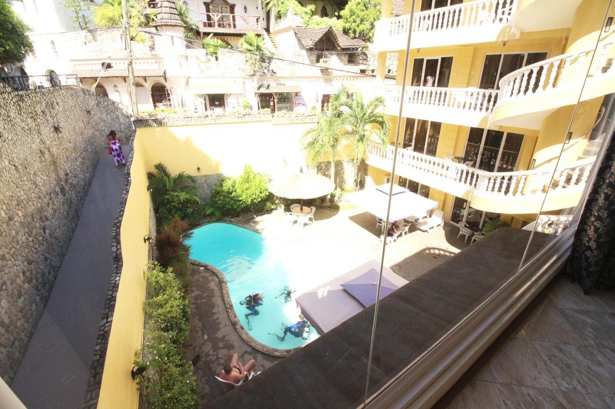 Mermaid Resort And Dive Center ปูแอร์โตกาเลรา ภายนอก รูปภาพ